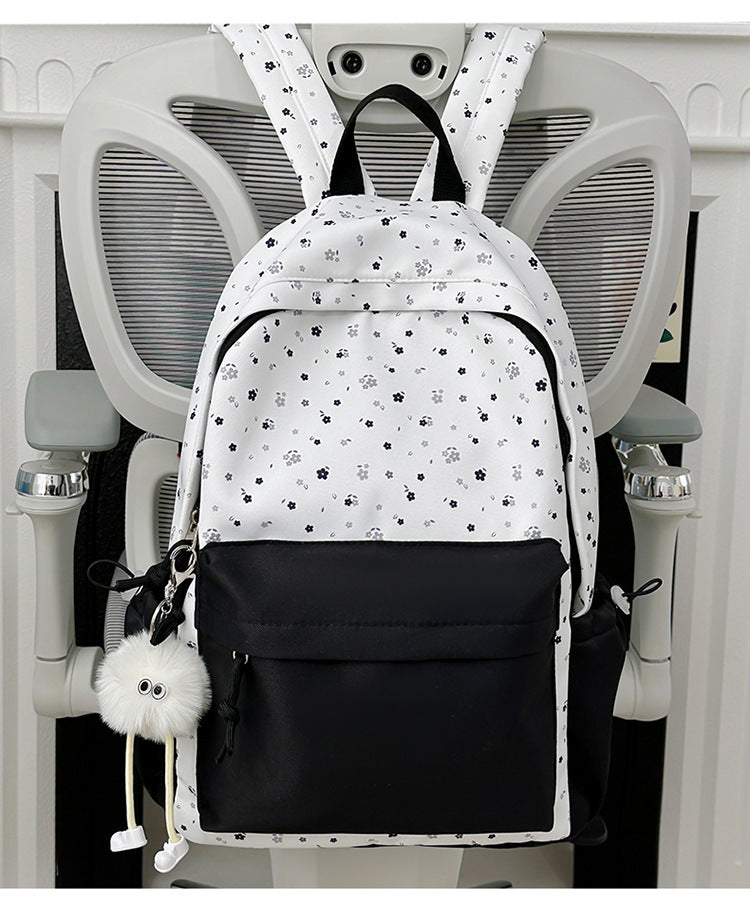 Mini backpack with floral design and practical organizer compartments Stornfield