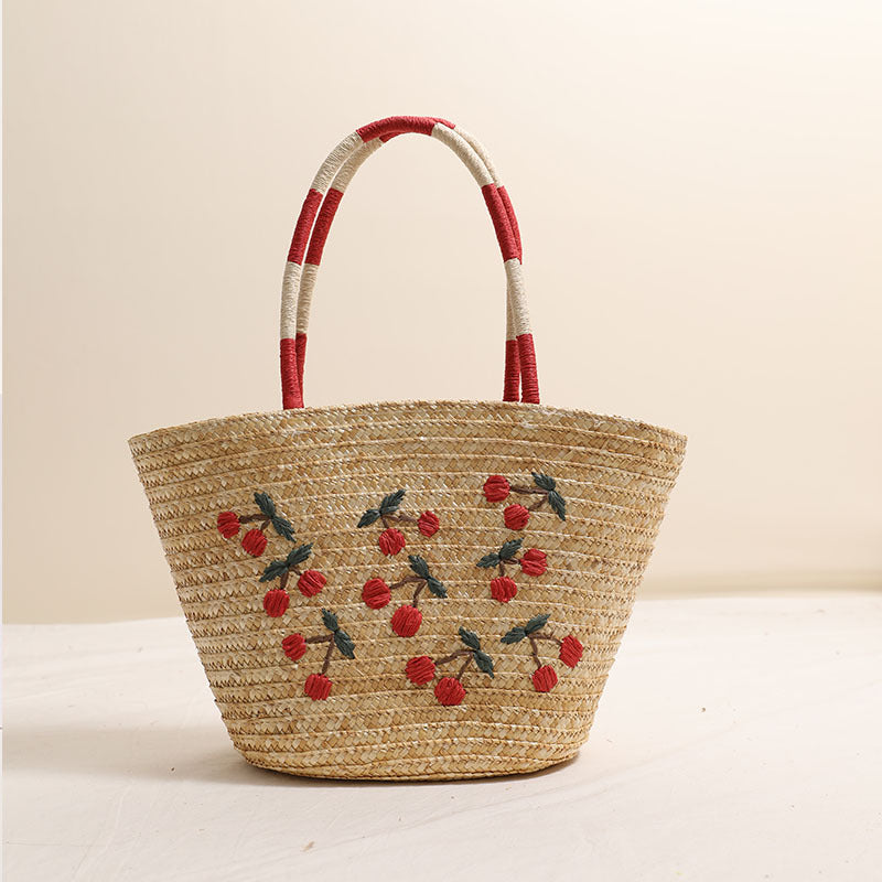 Handcrafted basket bag with vibrant floral embroidery design Stornfield