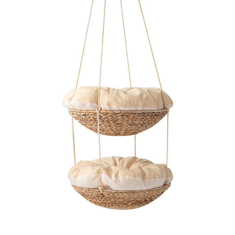 Hanging chair made of braided natural material with comfortable cushions Stornfield