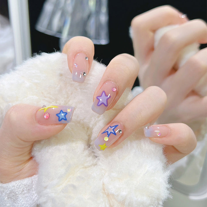 Artificial nail set with elegant blooming decorations and delicate ombre effect Stornfield
