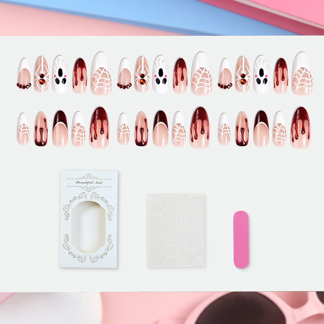 Creative nail art set with Halloween designs and glitter elements Stornfield