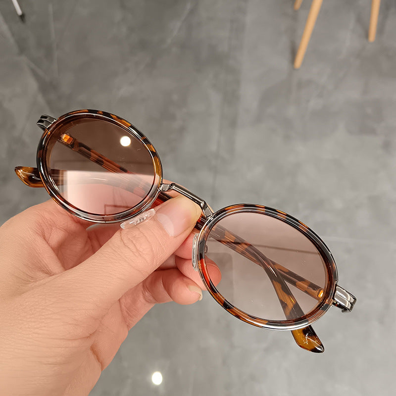 Women's round sunglasses with lightweight lenses and gold accents Stornfield