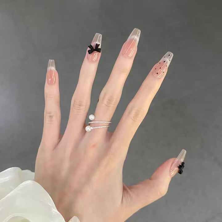 Artistic Long Stiletto Press-On Nails with Bow Accents Stornfield