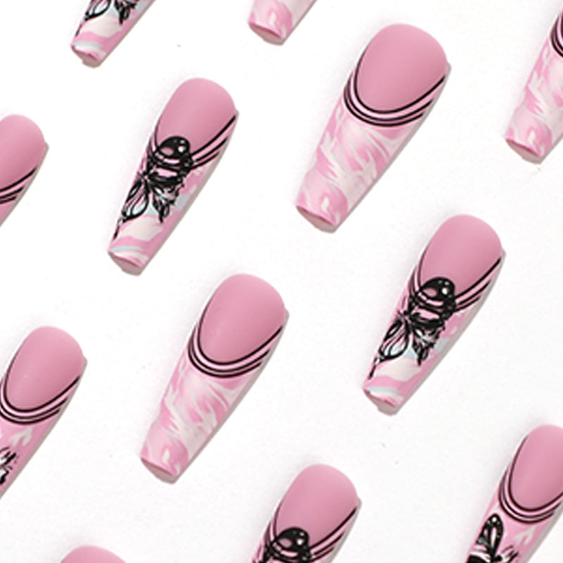 Artificial nail art with delicate butterfly designs Stornfield