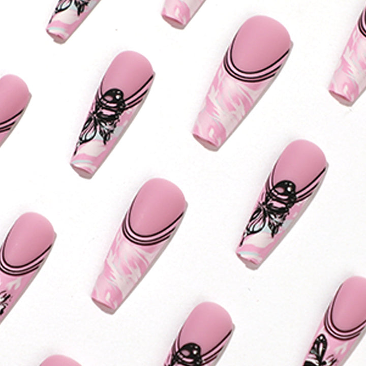 Artificial nail art with delicate butterfly designs Stornfield
