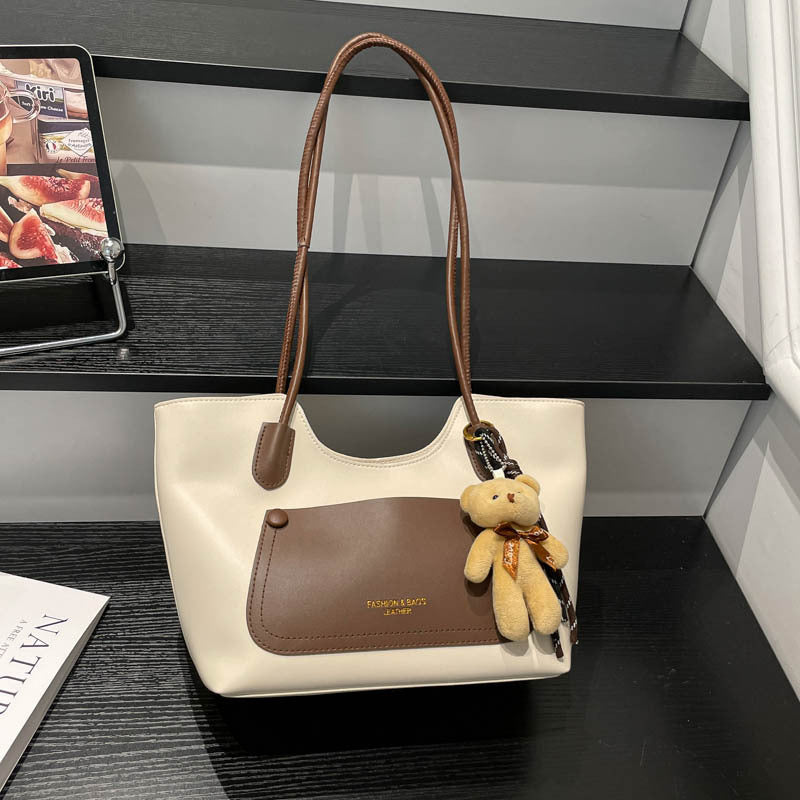 Elegant Tote Handbag with Plush Keychain