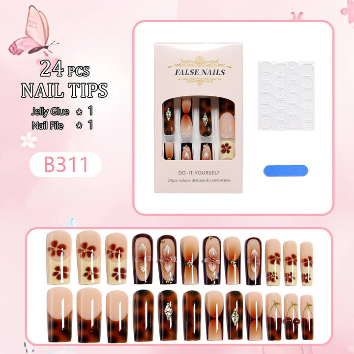 Artificial nails with creative 3D flower design and glitter accents Stornfield