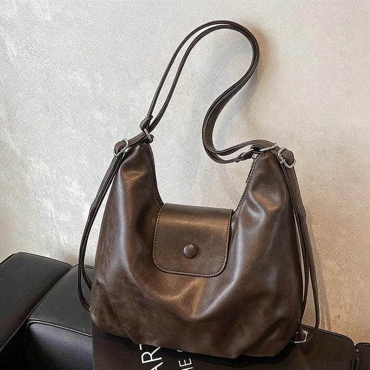 Modern shoulder bag with practical flap closure Stornfield