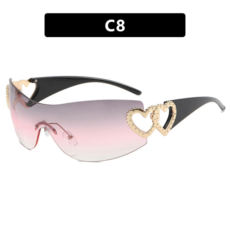 Ladies sporty sunglasses in trendy shield design with heart accents Stornfield
