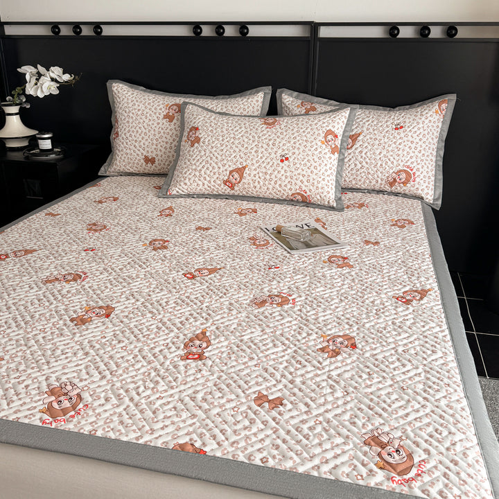 Quilted bedspread and pillow set with geometric striped quilting