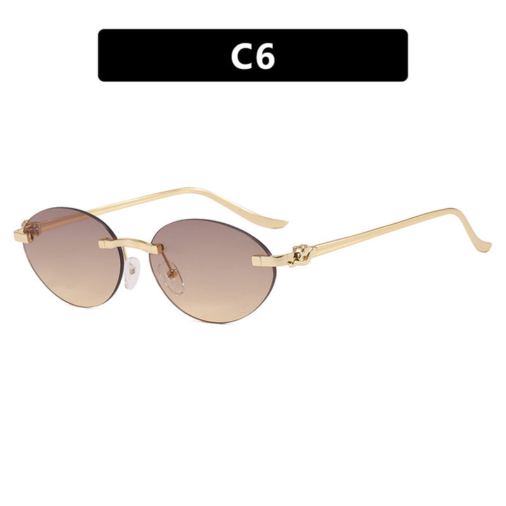 Women's elegant oval sunglasses with golden accents Stornfield