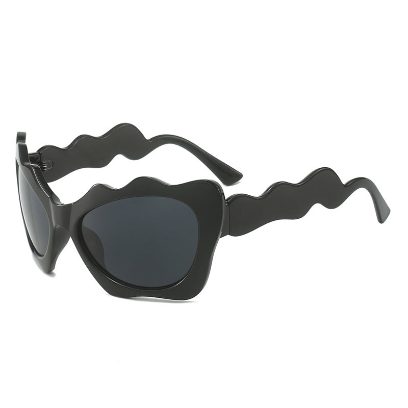 Ladies extravagant sunglasses with wavy frame design Stornfield