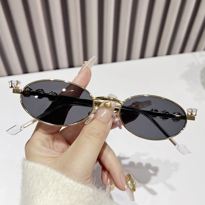 Fashion-Forward Oval Sunglasses with Crystal Accents Stornfield