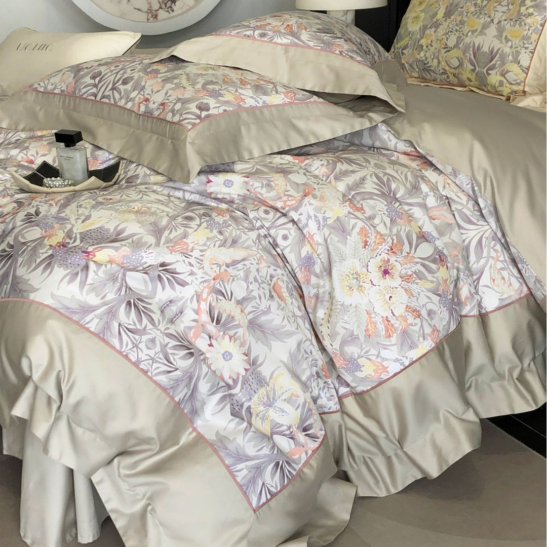 Luxurious cotton satin bedding set with floral print, ruffled bed skirt, and pillowcases