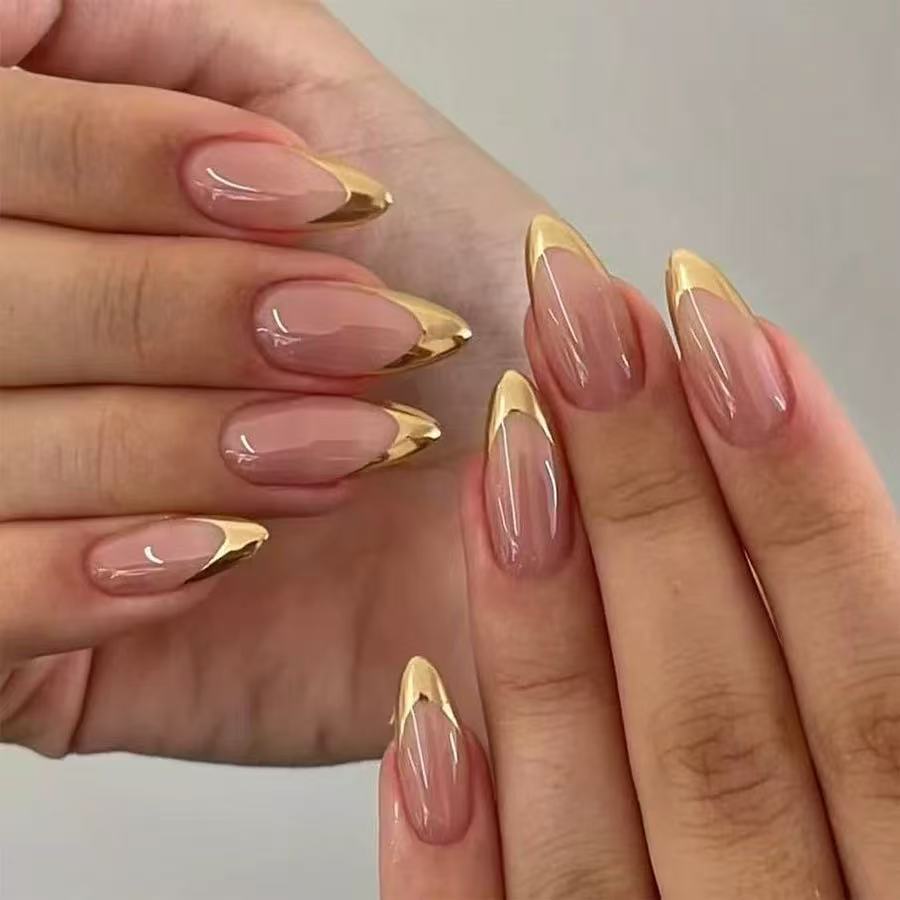 Artificial nail set with elegant gold tip design Stornfield