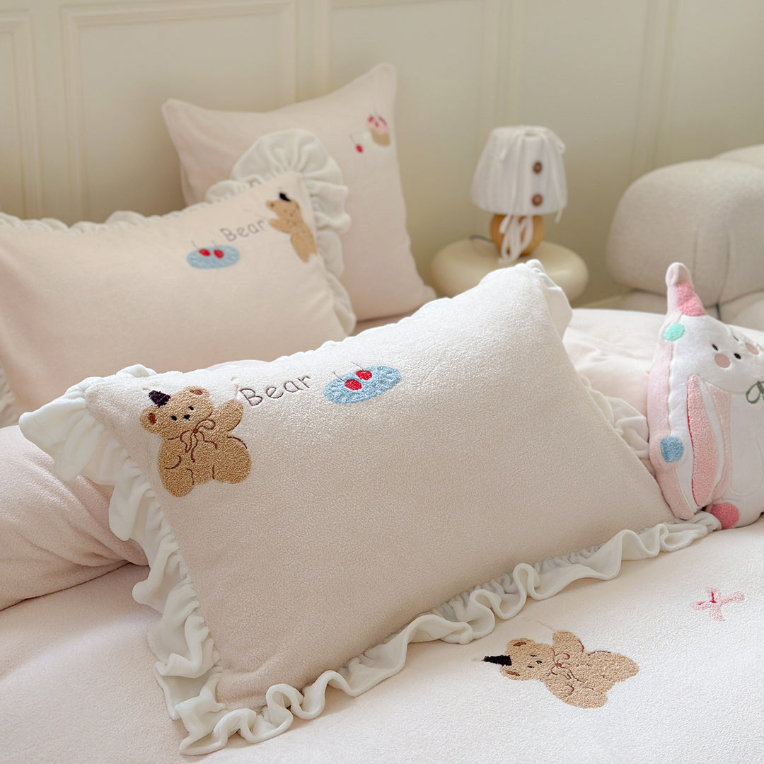 Bedding set with plush surface, ruffled hem and cute embroidery designs