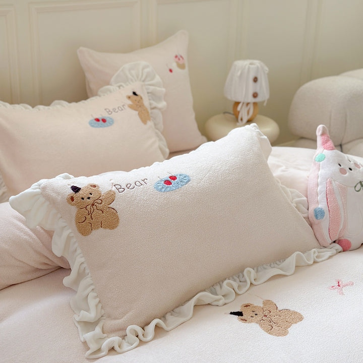 Bedding set with plush surface, ruffled hem and cute embroidery designs