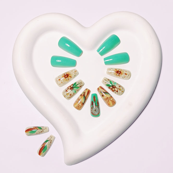Creative artificial nails with floral and dreamcatcher design elements Stornfield