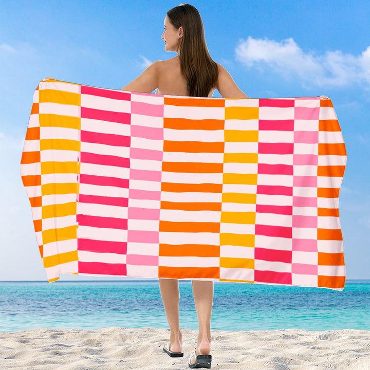 Beach towel with vibrant gradient color and stylish striped design Stornfield