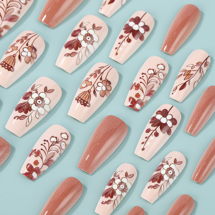 Artificial nails with filigree flower designs Stornfield