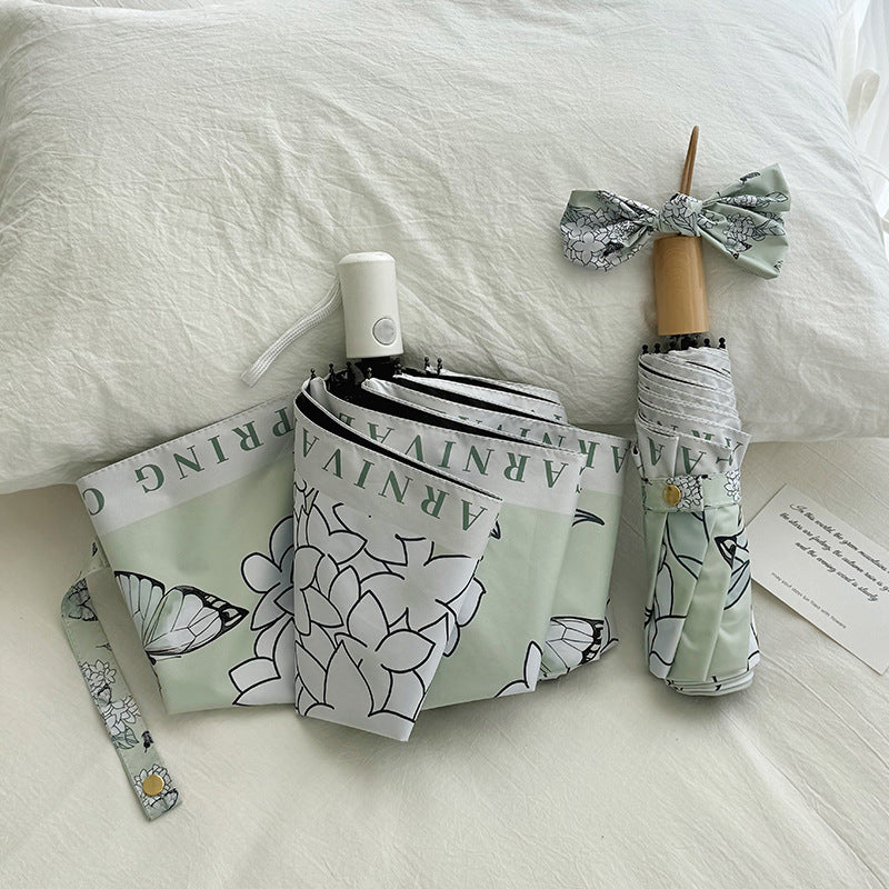 Women's Folding Umbrella with Innovative Floral Design Stornfield
