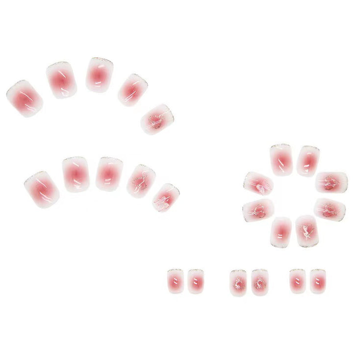 Artistic acrylic nails with heart and butterfly motifs Stornfield