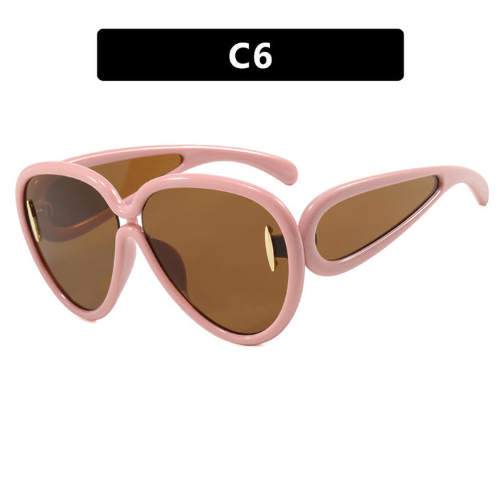 Women extravagant sunglasses in creative design Stornfield