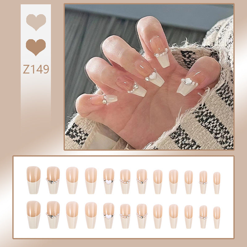 Artificial nail set with elegant flower and glitter decorations Stornfield