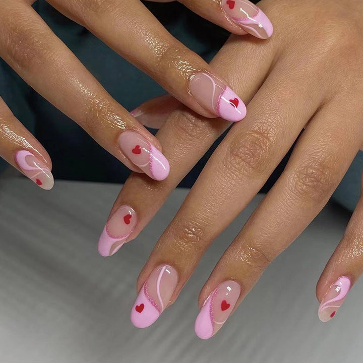 Artistic Nail Extensions with Heart Motif Stornfield