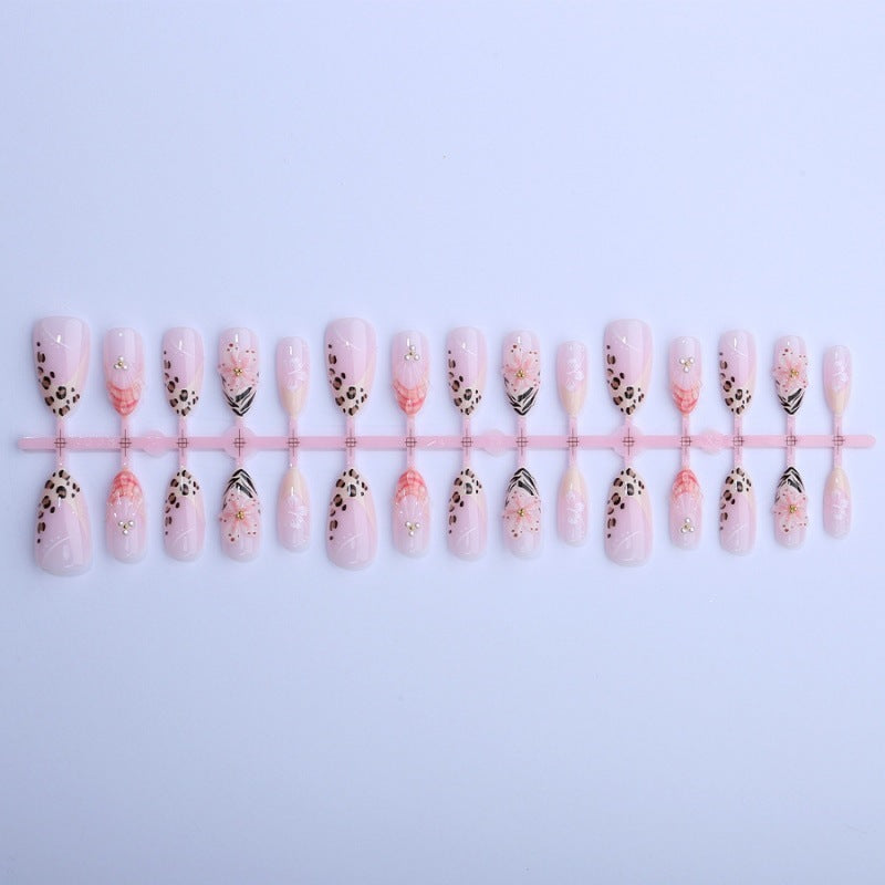 Artificial nail set with floral and leopard designs Stornfield