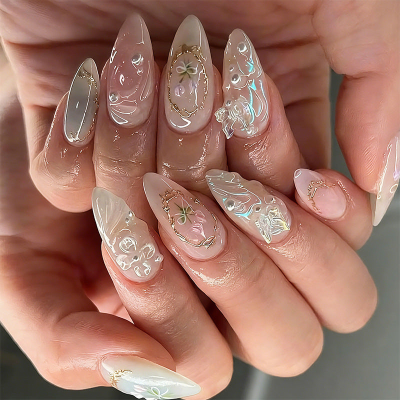 Elegant artificial nails with holographic and floral decorations Stornfield
