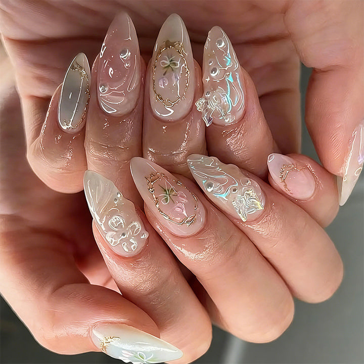 Elegant artificial nails with holographic and floral decorations Stornfield