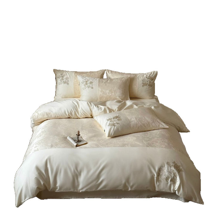 Silky satin bedding set with jacquard relief, floral embroidery, and ruffle