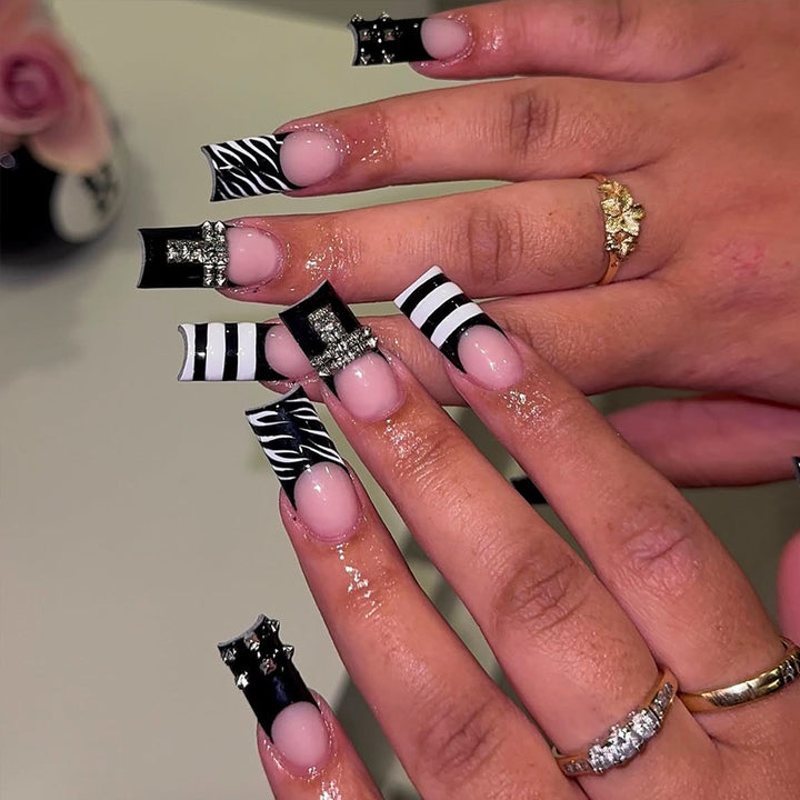 Artificial Nails in Modern Stripe and Zebra Design Stornfield