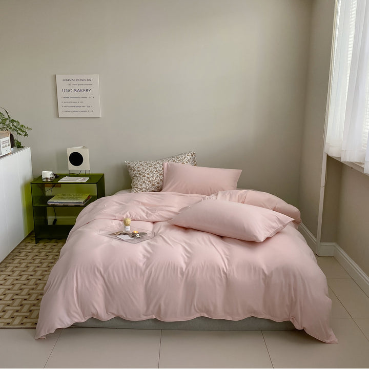 Minimalistic duvet cover set made of skin-friendly cotton blend with soft fiber filling