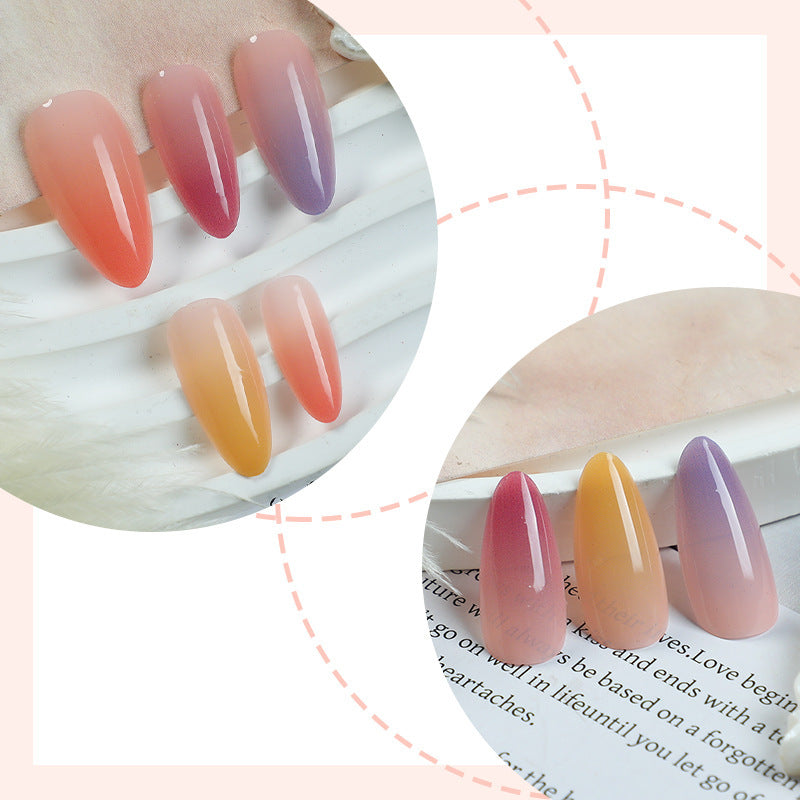 Acrylic nail set with elegant ombre design and high-gloss surface Stornfield