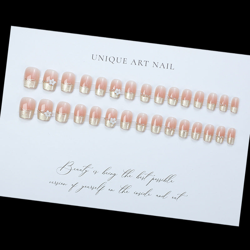 Decorative Press-On Nail Extensions with Floral Accents Stornfield