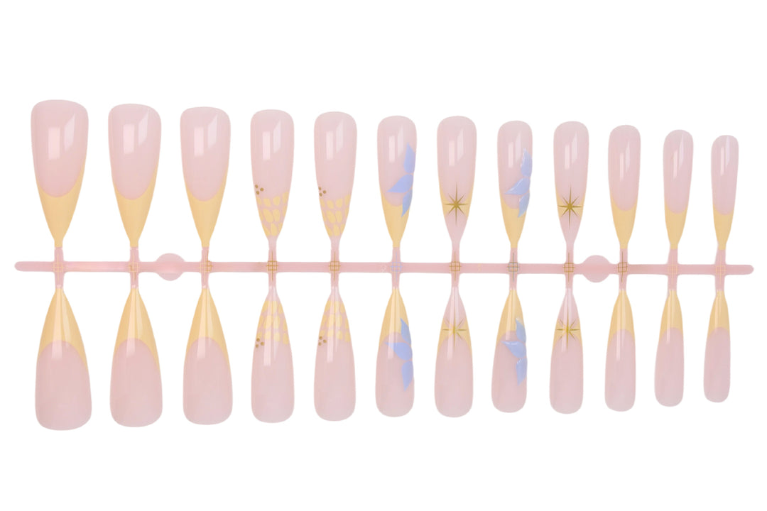 Artificial nail set with elegant floral design and golden accents Stornfield