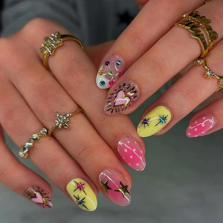 Artificial nail set with creative 3D designs and glitter accents Stornfield