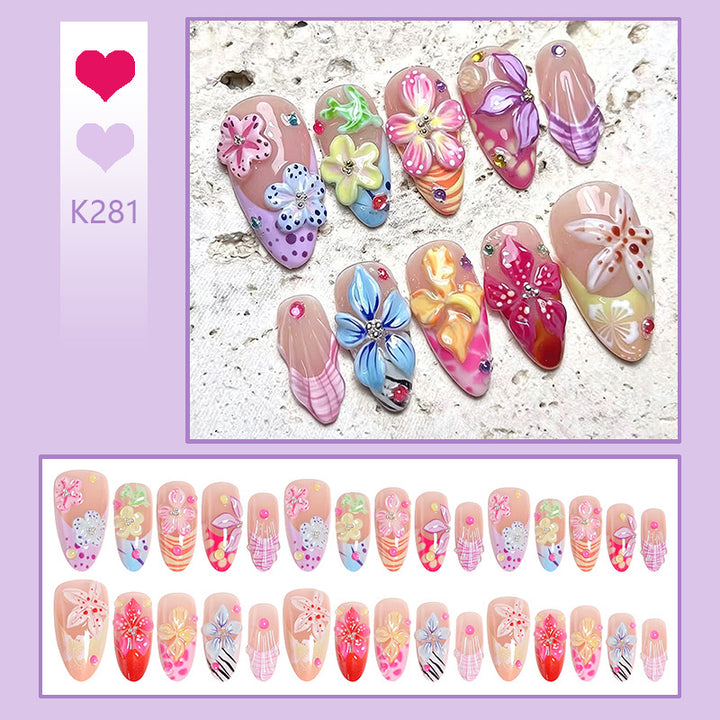 Artificial nail set with blooming 3D flower accents Stornfield
