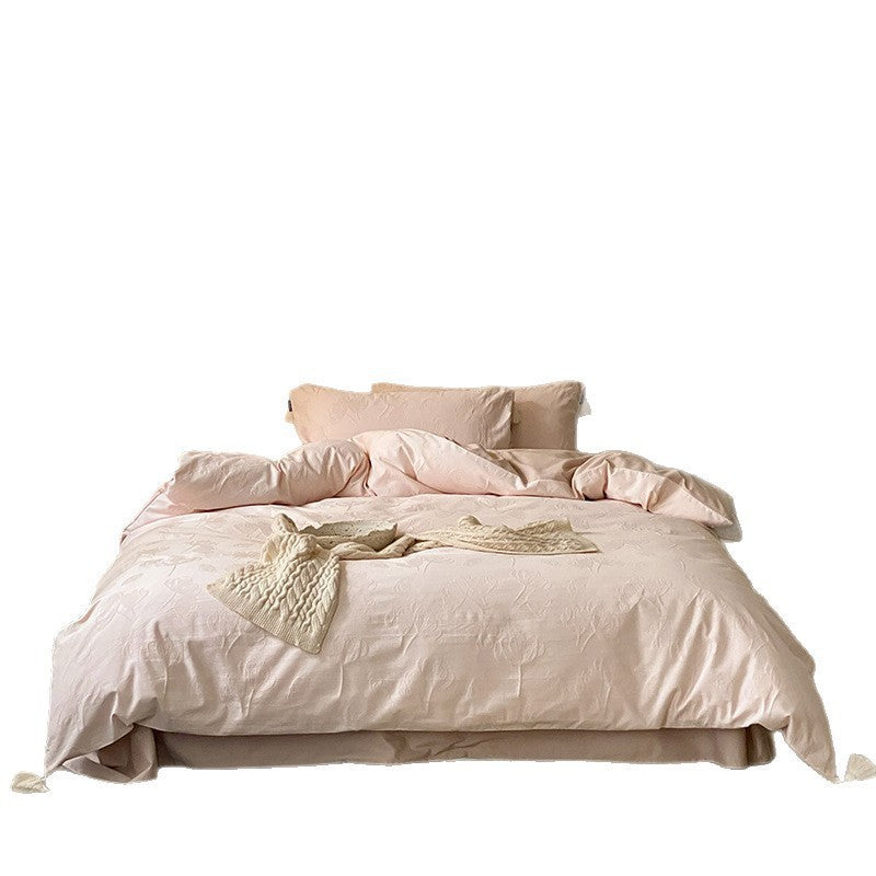 Finely textured cotton satin bedding set with tone-on-tone relief