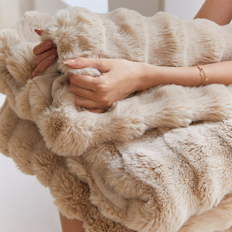 Cozy artificial fur throw blanket with wave structure and extra soft texture