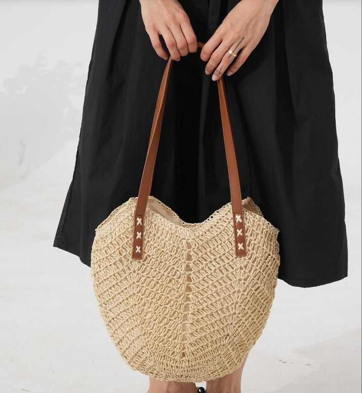Elegant Bast shoulder bag with leather accents Stornfield