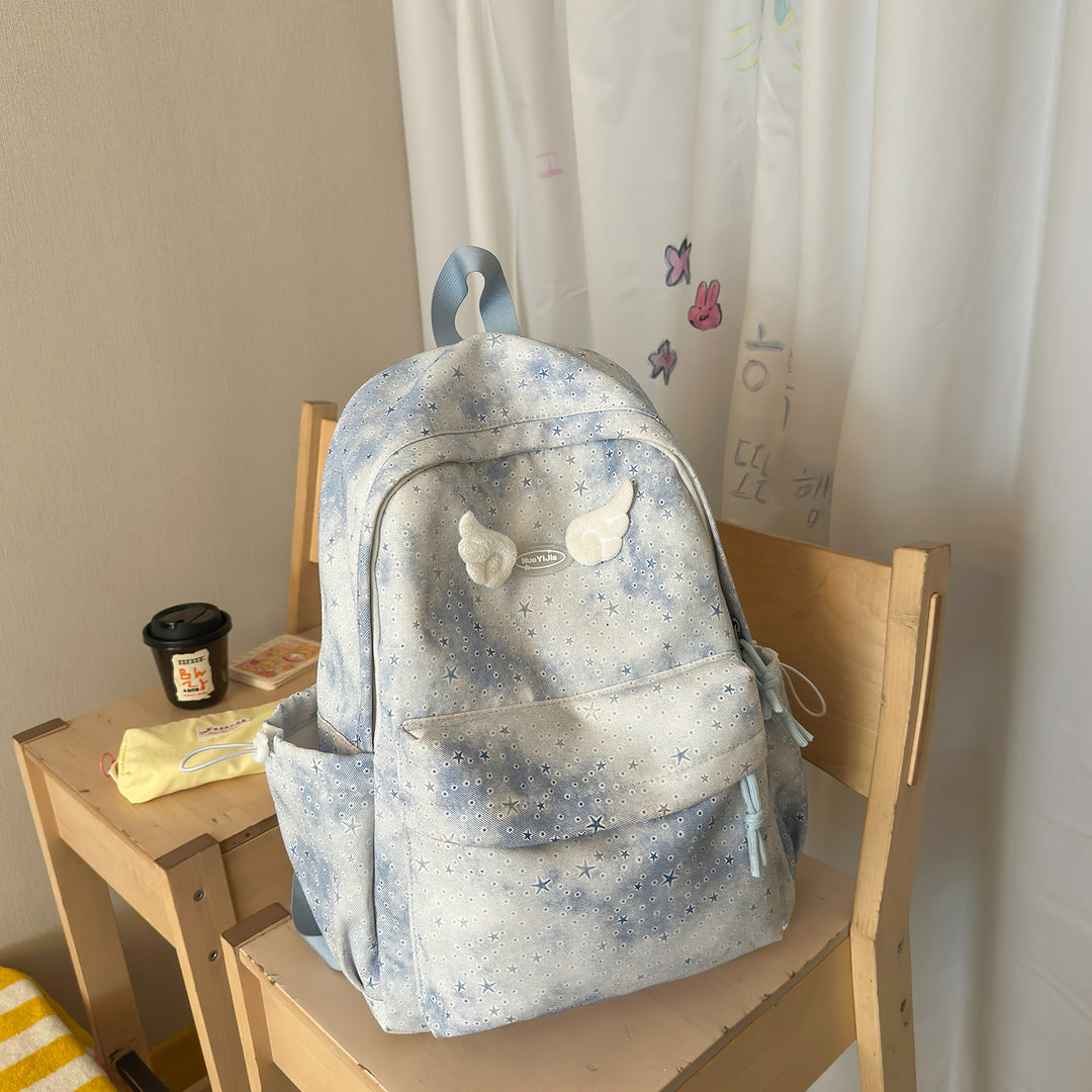 Functional Backpack with Decorative Wing Accents Stornfield