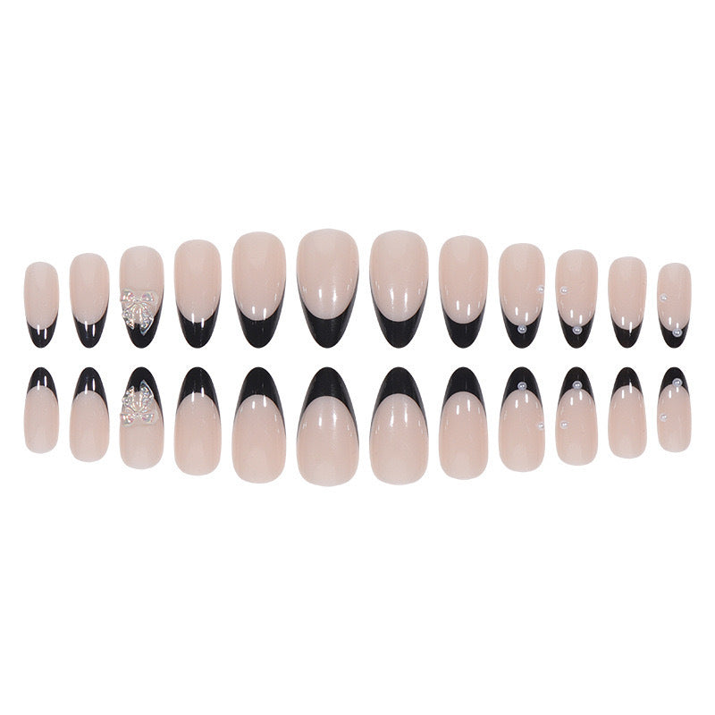 Artificial nail set with glossy French design and delicate 3D accents Stornfield