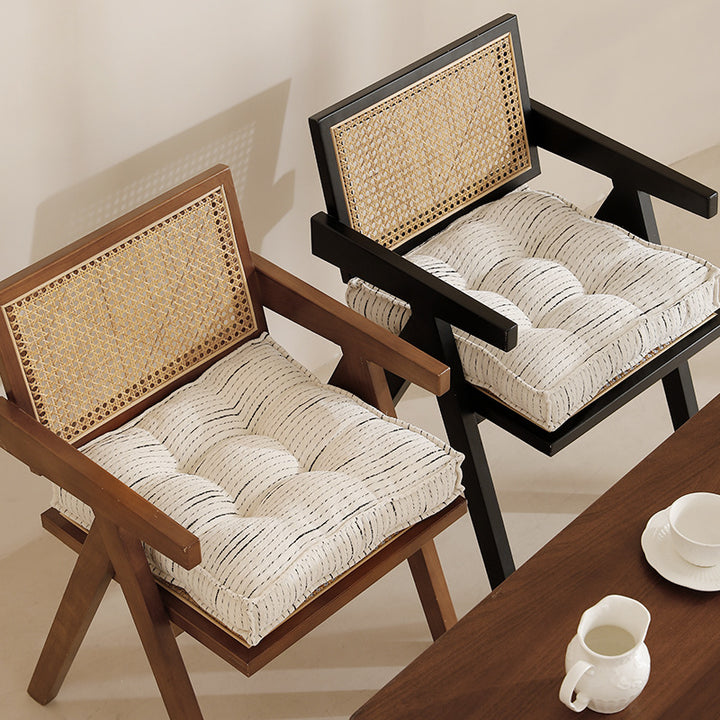 Padded square seat and floor cushion with quilted tufted padding and carrying handle Stornfield