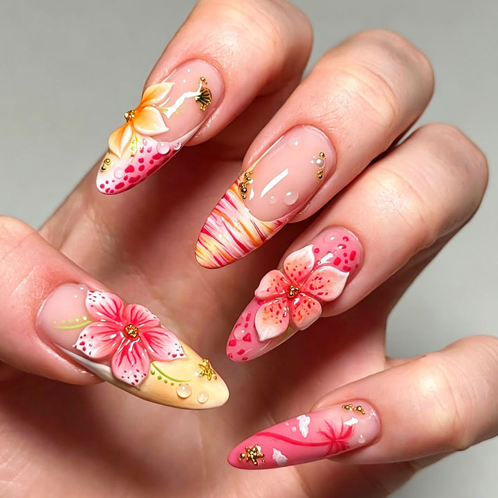 Artificial nails with floral embellishments and glitter accents Stornfield