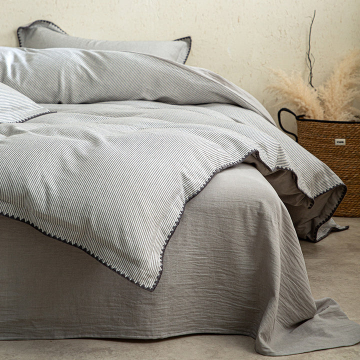 Linen-Cotton duvet cover set with fine striped texture and decorative trim