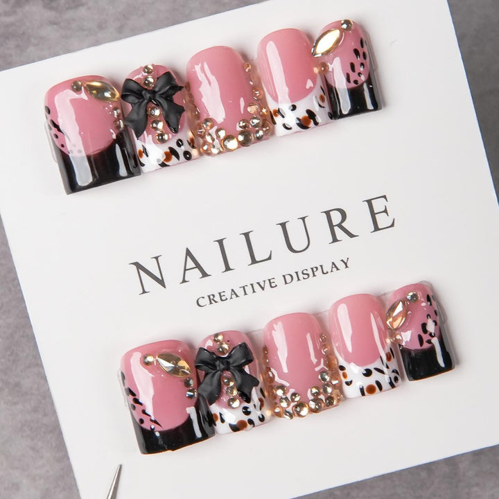 Decorative Press-On Nail Art with Gem Accents