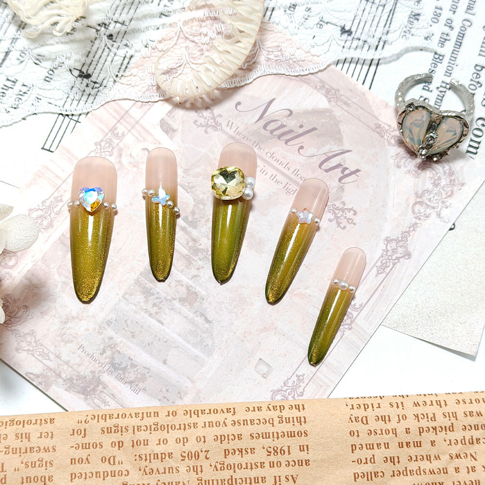 Artificial nails with Elegant Ombre Effect and Glitter Accents Stornfield